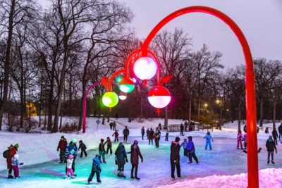 Bokeh light installation with people skating