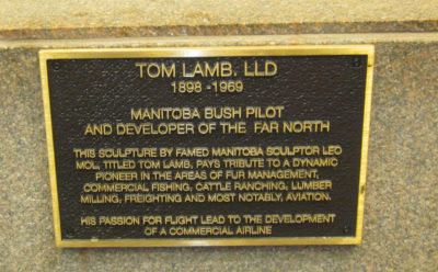 The plaque at the front of the Tom Lamb sculpture